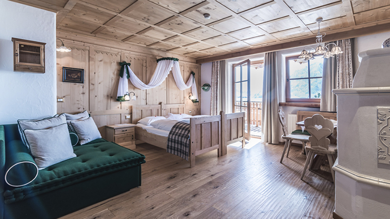 Urlaub Gröden Zimmer mit Holzofen