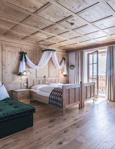 Suites in South Tyrolean style wooden rooms Dolomites